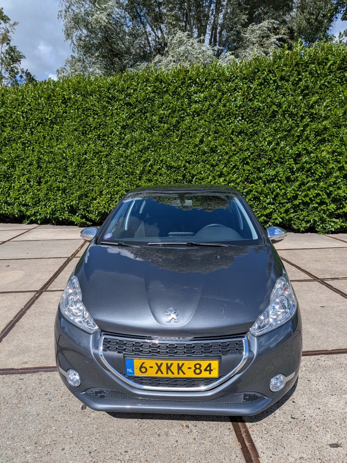 Peugeot 208 1.2 style in prima staat, Auto's, Voorwielaandrijving, Dealer onderhouden, Stof, Zwart