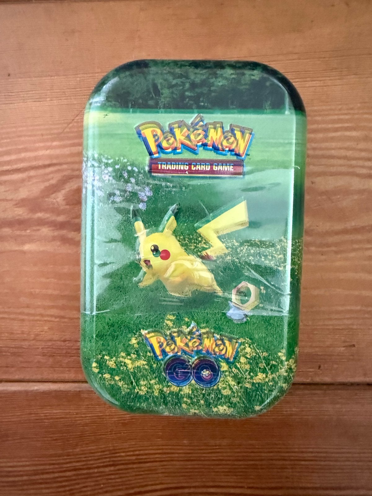 Pokémon GO Mini Tin - Misdruk Pikachu, Ophalen of Verzenden, Nieuw, Overige typen