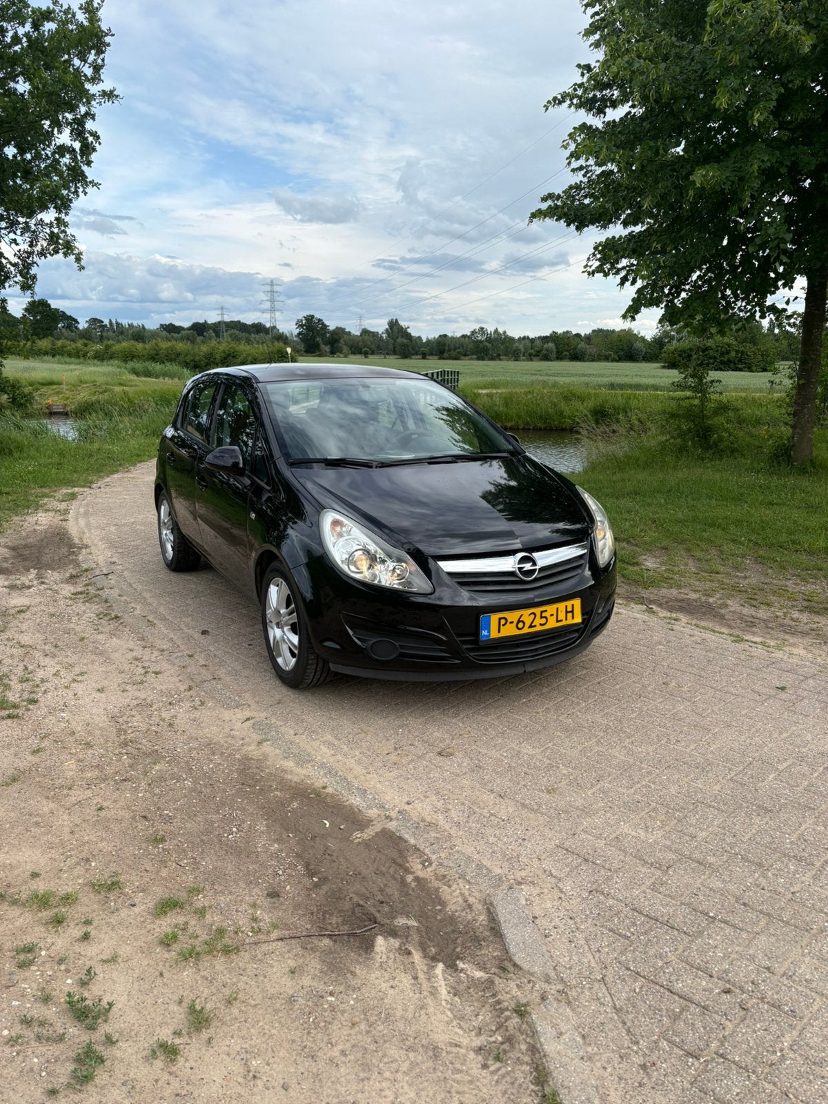Opel Corsa 1.2 16V 5D 2008 Zwart, Voorwielaandrijving, 4 cilinders, 1229 cc, Handgeschakeld
