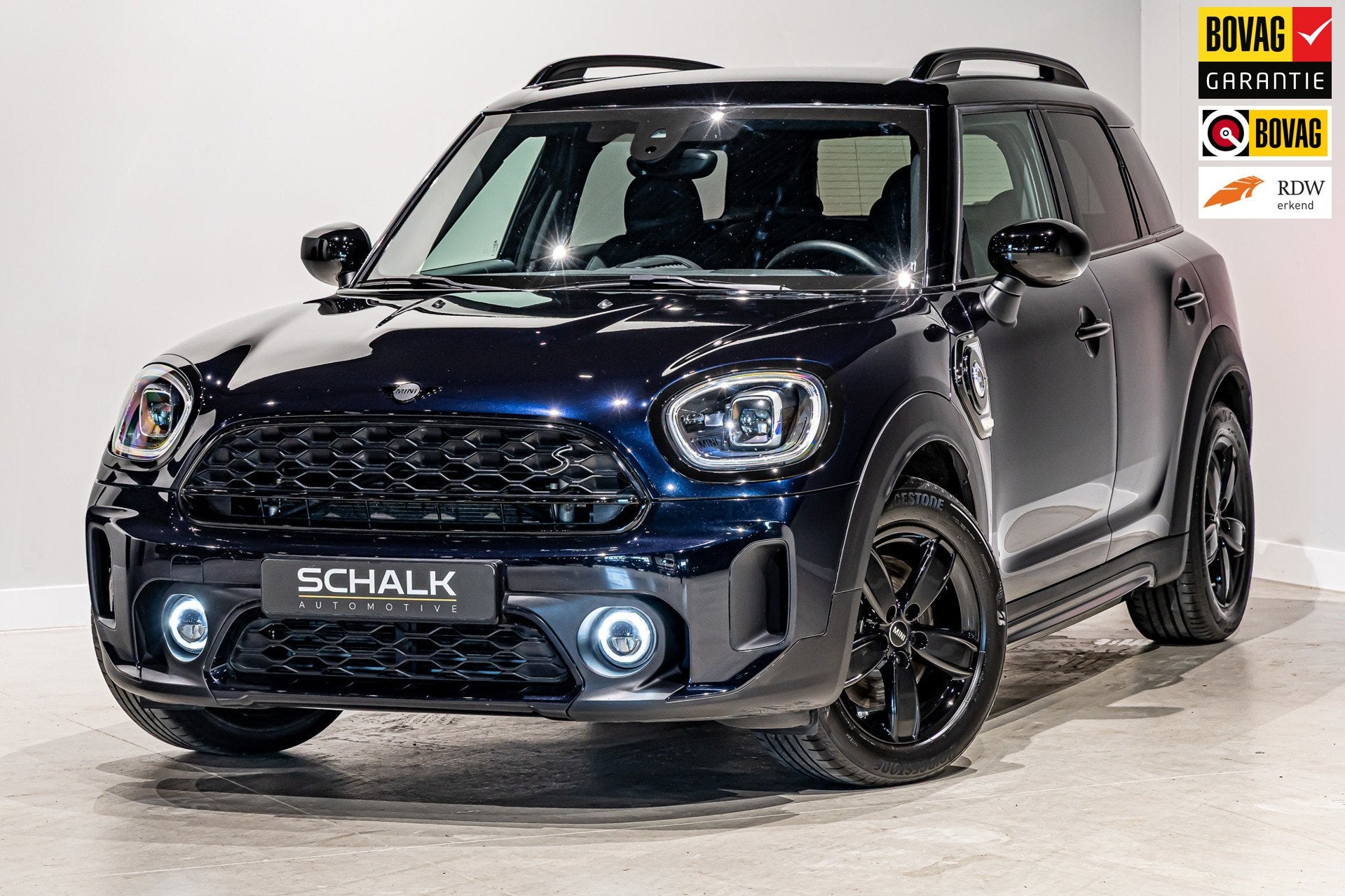 Mini Countryman 1.5 Cooper S E ALL4 Essential|HUD|Leder|Cam, Auto's, Automaat, Dealer onderhouden, Zwart, Countryman