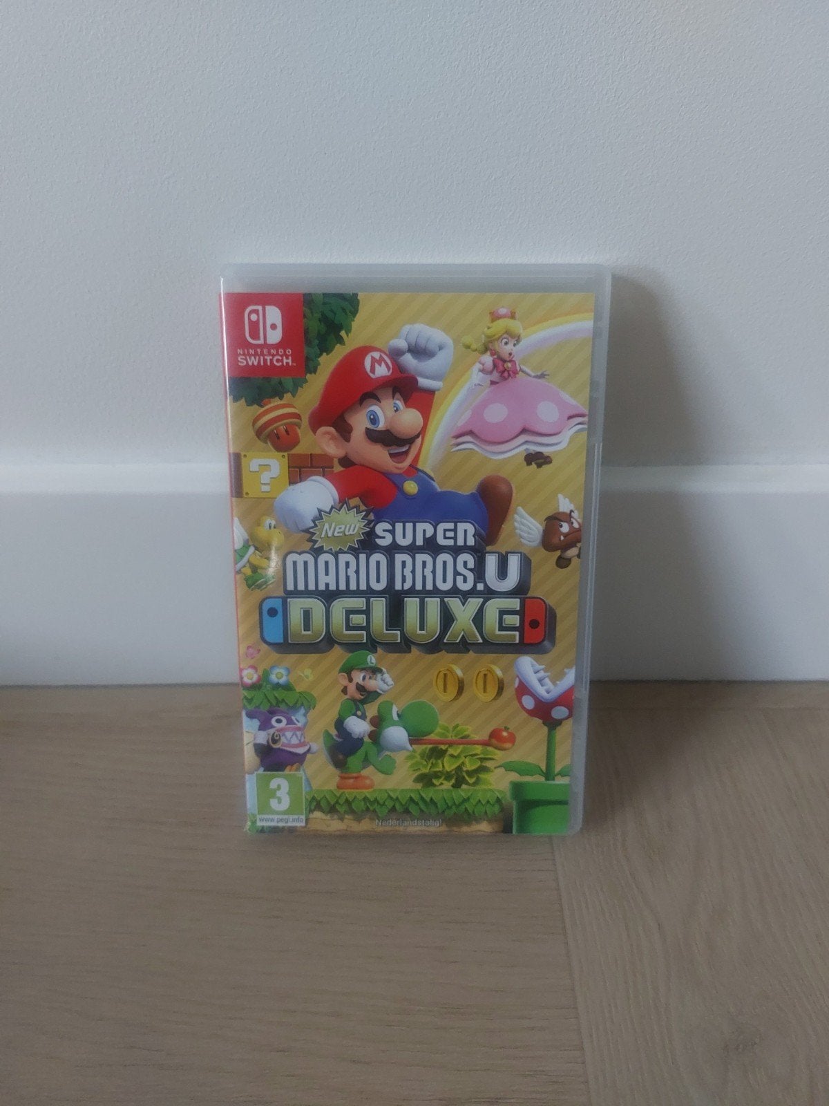 New Super Mario Bros. U Deluxe, Ophalen of Verzenden, Zo goed als nieuw, Platform, 3 spelers of meer