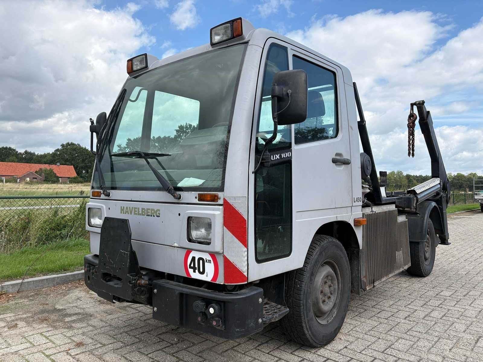 Havelberg - L 450 - UX100 - Haakarmvoertuig / Containerwagen, Auto's, Gebruikt, Overige carrosserieën, Overige brandstoffen, Origineel Nederlands