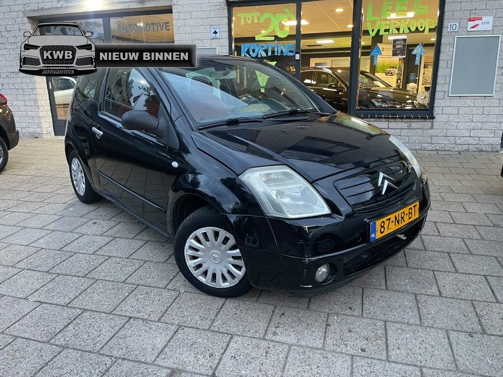 Citroën C2 1.4i Ligne Ambiance Airco Nieuwe apk (bj 2004), Auto's, 450 kg, 4 cilinders, 4 stoelen, Zwart