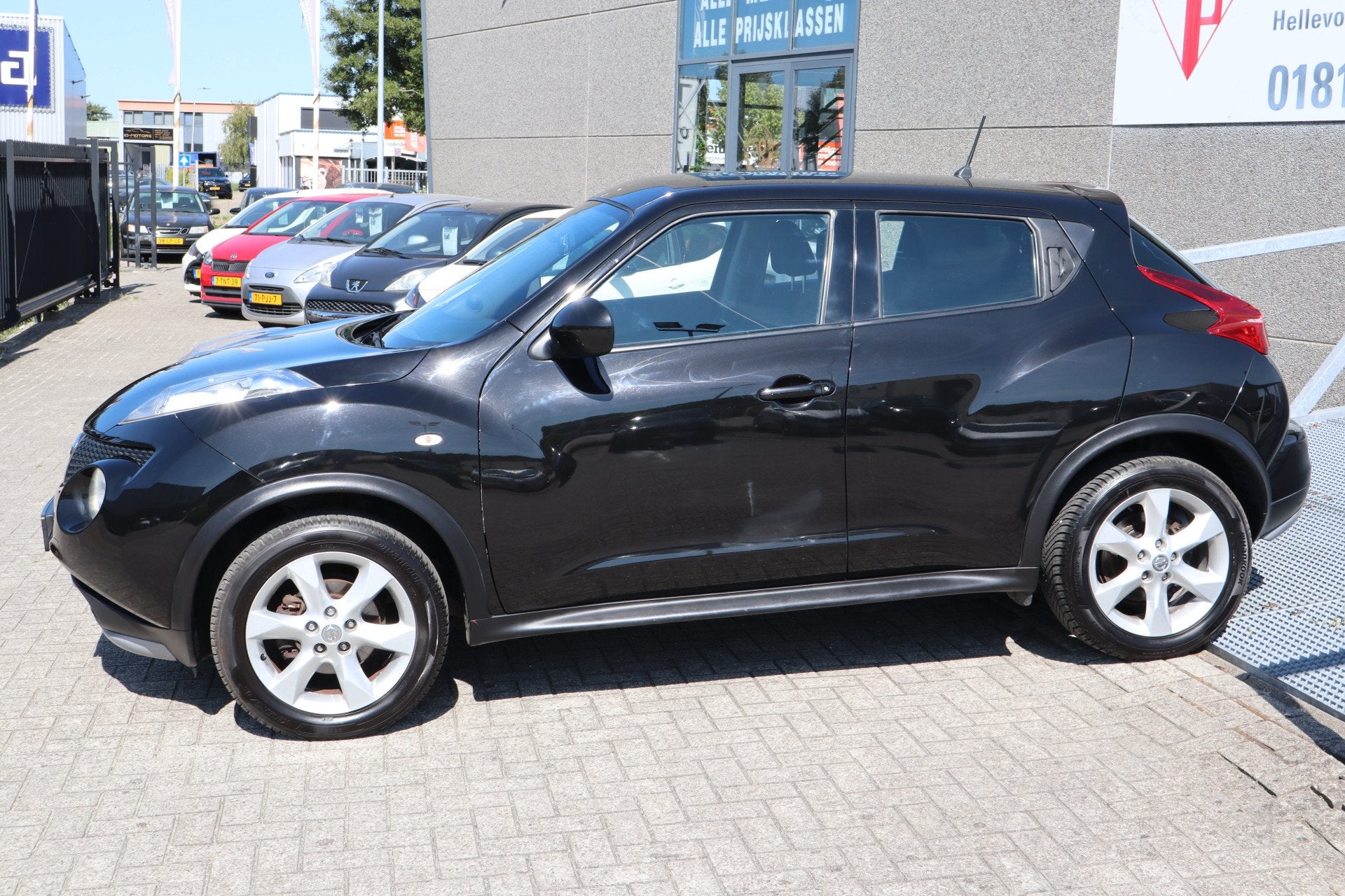 Nissan Juke 1.6 Acenta Eco Afneembare trekhaak/Cruise contro, Auto's, Nissan, Euro 5, Stof, Zwart, 4 cilinders