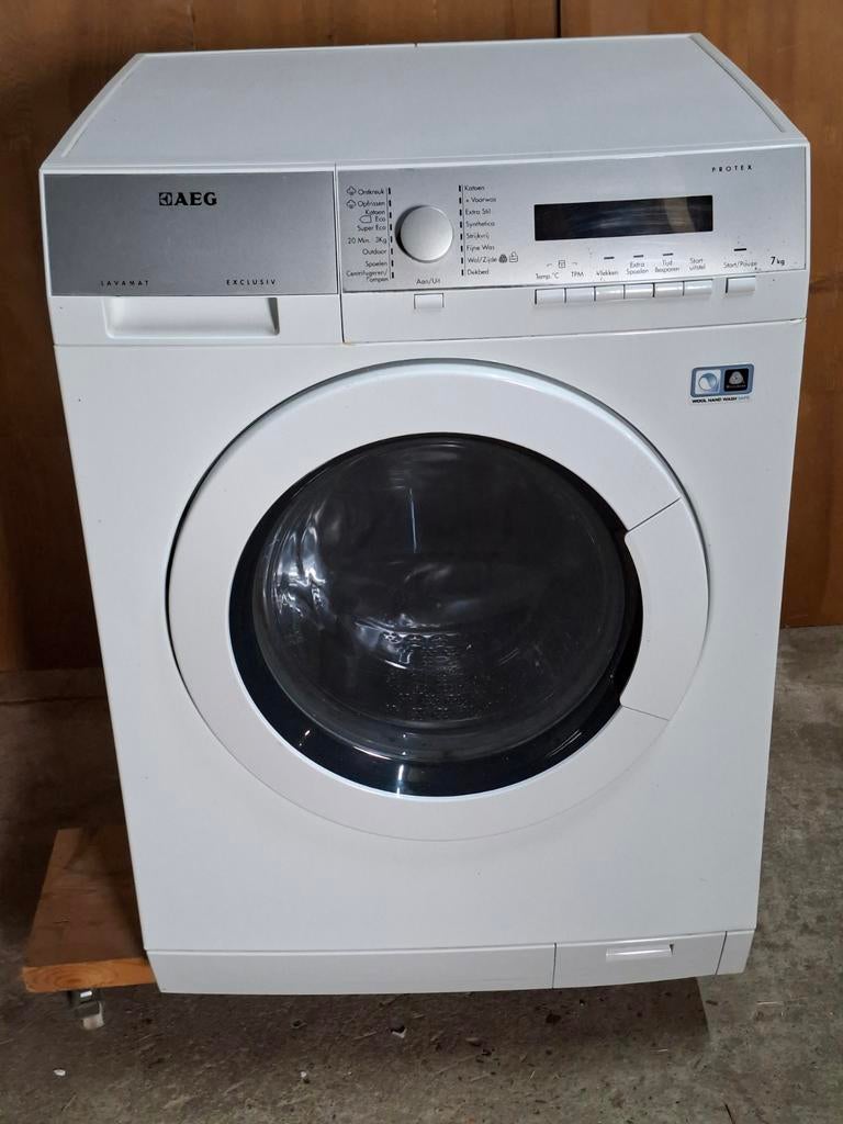 AEG wasmachine (7 kg), 6 tot 8 kg, Ophalen, 1200 tot 1600 toeren, 85 tot 90 cm