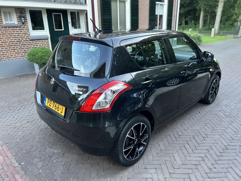 Suzuki Swift 1.2 5-drs. Bandit Airco, Cruise, LM-velgen, Auto's, Voorwielaandrijving, 94 pk, Stof, Gebruikt