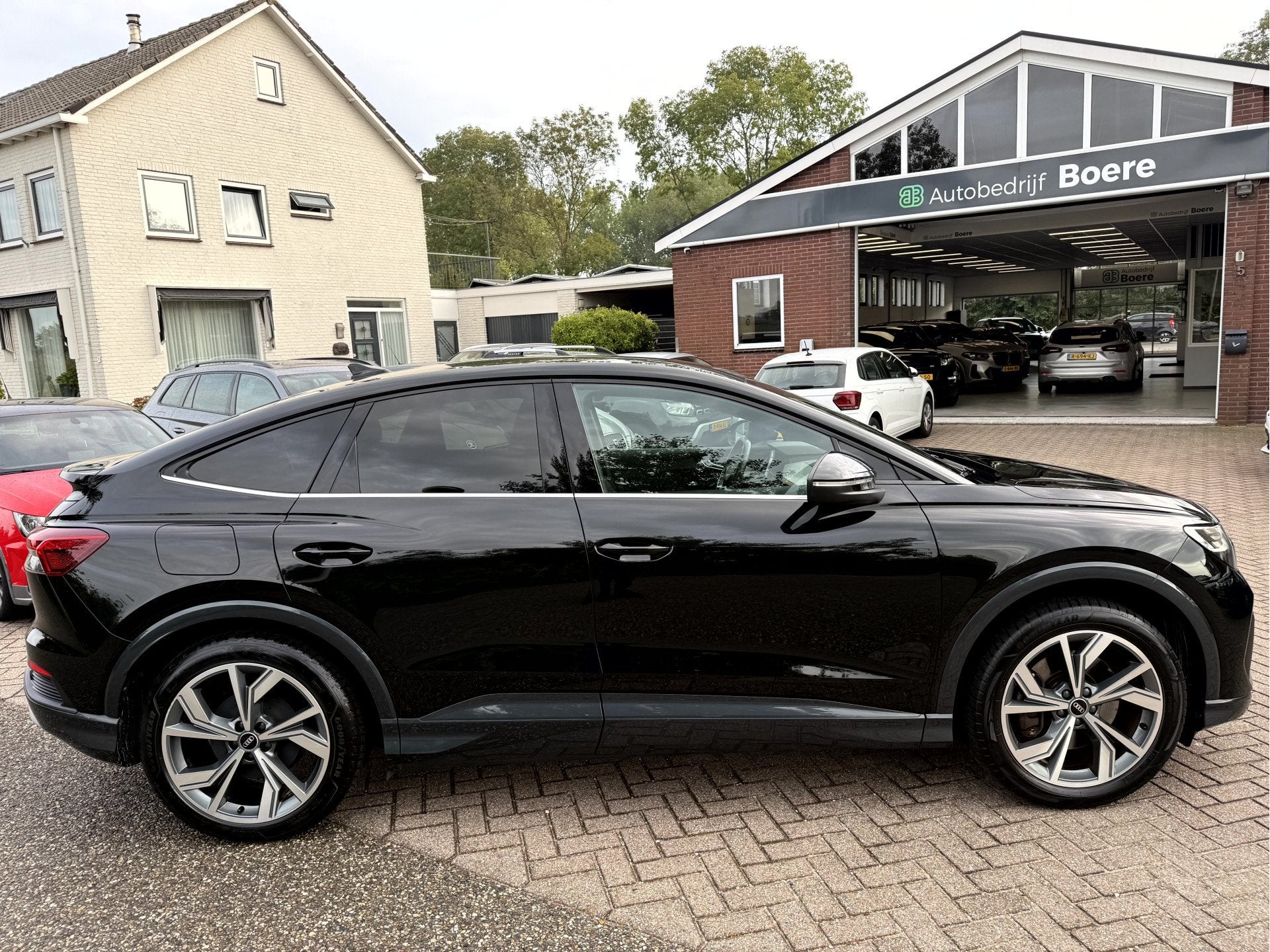 Audi Q4 Sportback e-tron 50 quattro 300pk Advanced edition 7, Auto's, Dealer onderhouden, Stof, Gebruikt, Zwart
