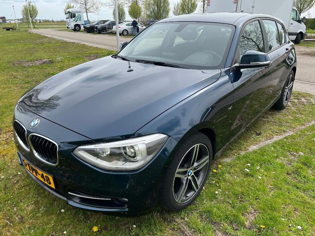 BMW 1-Serie 116I 100KW 5DR 2014 Blauw, Auto's, BMW, 4 cilinders, Blauw, Origineel Nederlands, 1200 kg