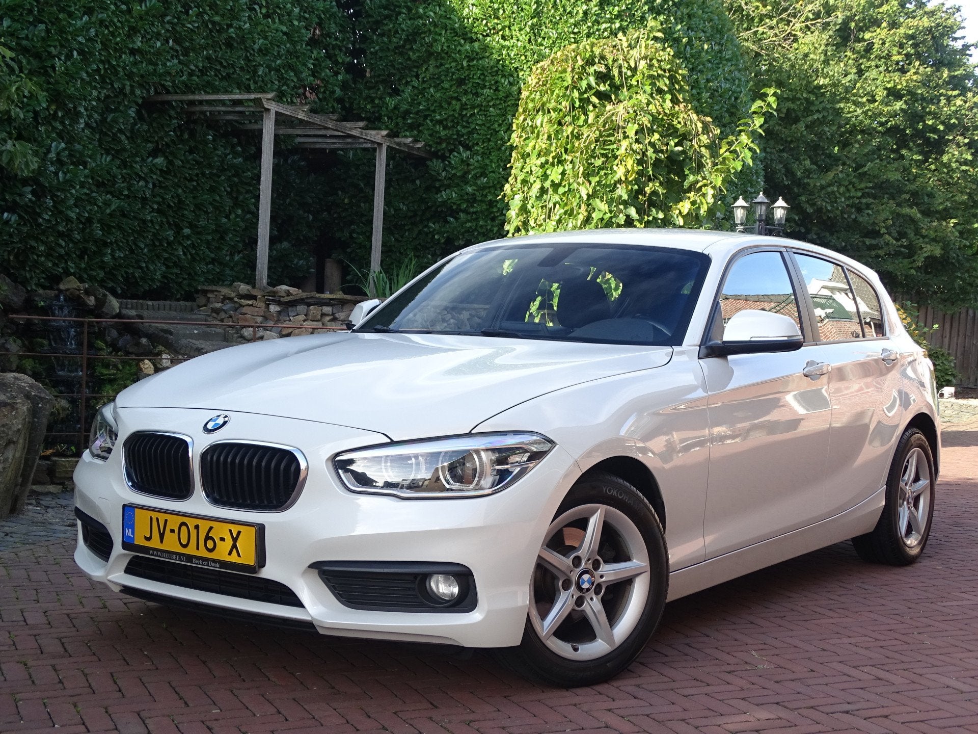 BMW 1-serie 118i Executive Automaat 1ste eig. Nw staat, Dealer onderhouden, Gebruikt, Wit, Bedrijf