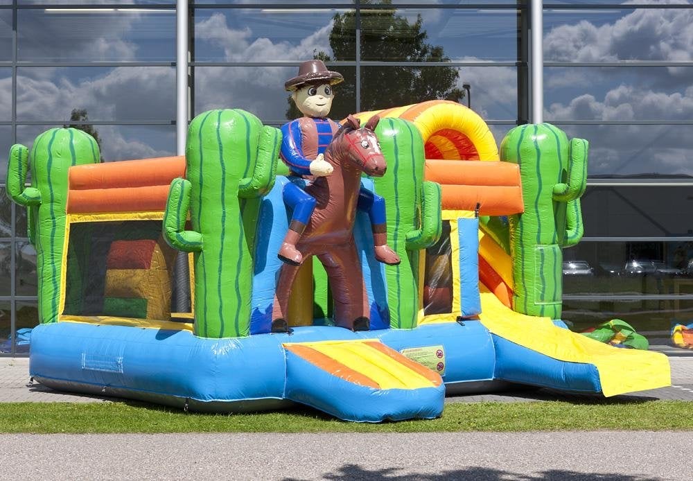 Opblaasbaar Springkasteel Cowboy Thema met Glijbaan, Ophalen of Verzenden, Gebruikt