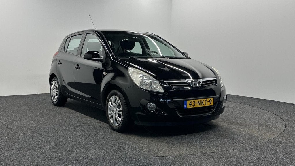 Hyundai i20 1.2i DynamicVersion 5 DEURS AIRCO TREKHAAK., Auto's, Hyundai, Elektrische ramen, Gebruikt, 31 €/maand, 4 cilinders