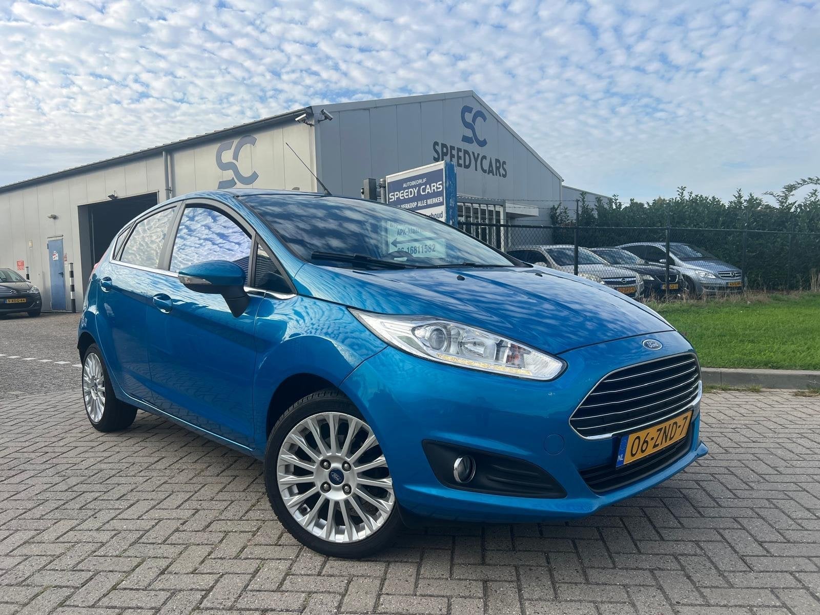 Ford Fiesta 1.0 EcoBoost Titanium Cruise Clima Navi PDC, Auto's, Voorwielaandrijving, Euro 5, Zwart, Blauw