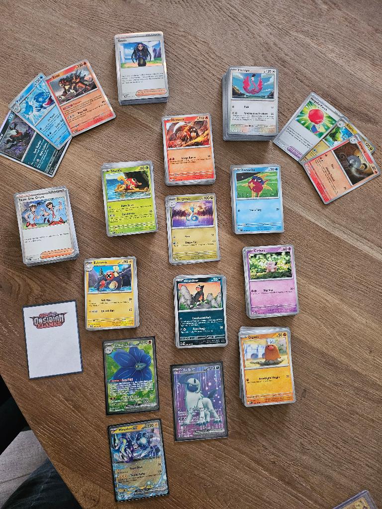 Pokemon. Obsidian Flames., Ophalen of Verzenden, Zo goed als nieuw, Meerdere kaarten