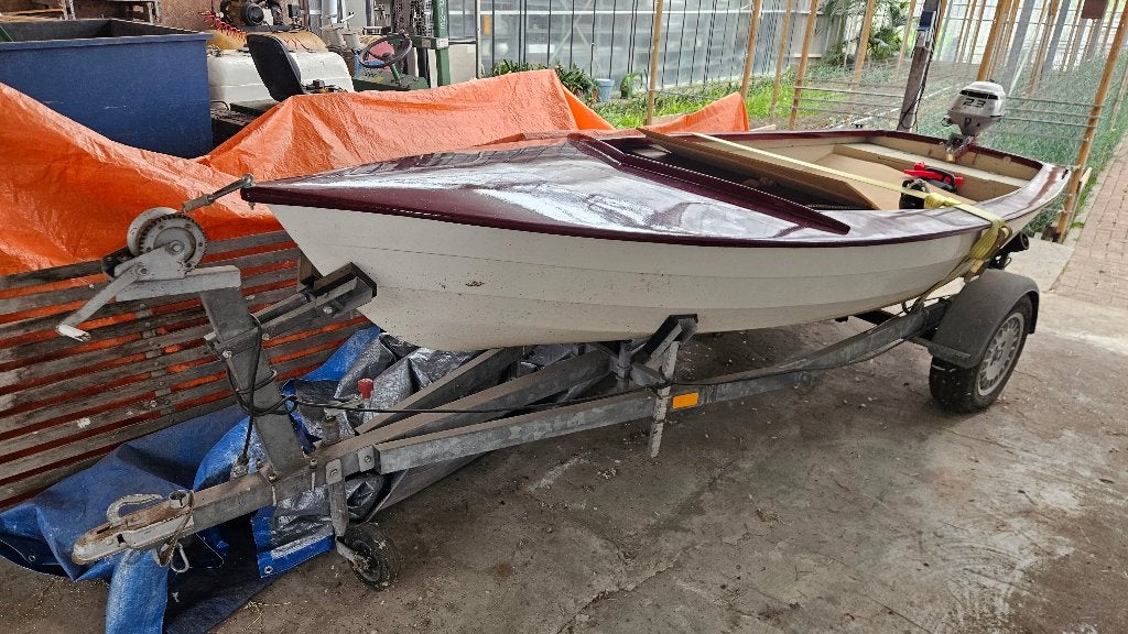 Zeilbootje met trailer en Honda 2.3 pk buitenboordmotor, Watersport en Boten, Gebruikt, Buitenboordmotor, Polyester, Overige typen
