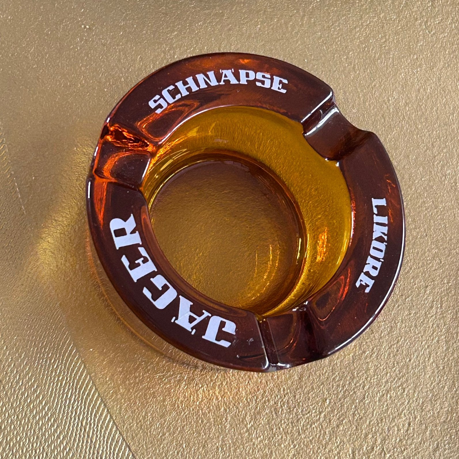 Jäger Schnäpse liköre asbak oranje/oker kleurig glas, Gebruikt, Onbekend, Ophalen of Verzenden, Onbekend