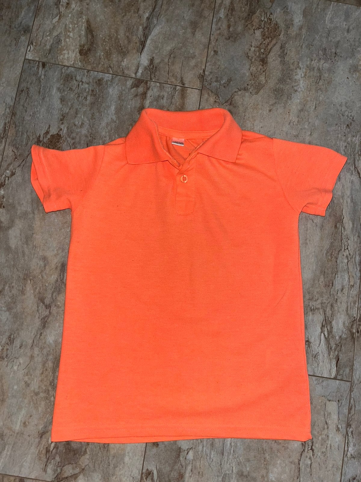 Oranje polo maat 122/128, Kinderen en Baby's, Kinderkleding | Maat 122, Ophalen of Verzenden, Zo goed als nieuw, Jongen, Shirt of Longsleeve