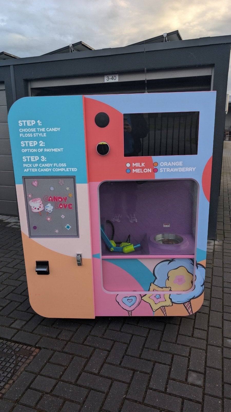 Volautomatische Suikerspin Vending Machine, Ophalen