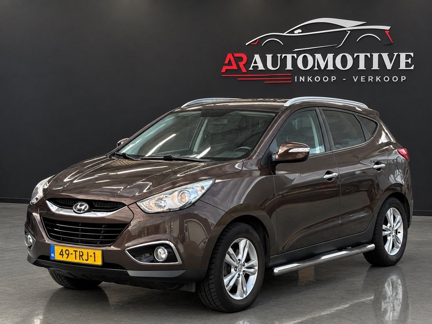 Hyundai Ix35 2.0i Style / Automaat, Auto's, Gebruikt, 4 cilinders, Bruin, Leder en Stof