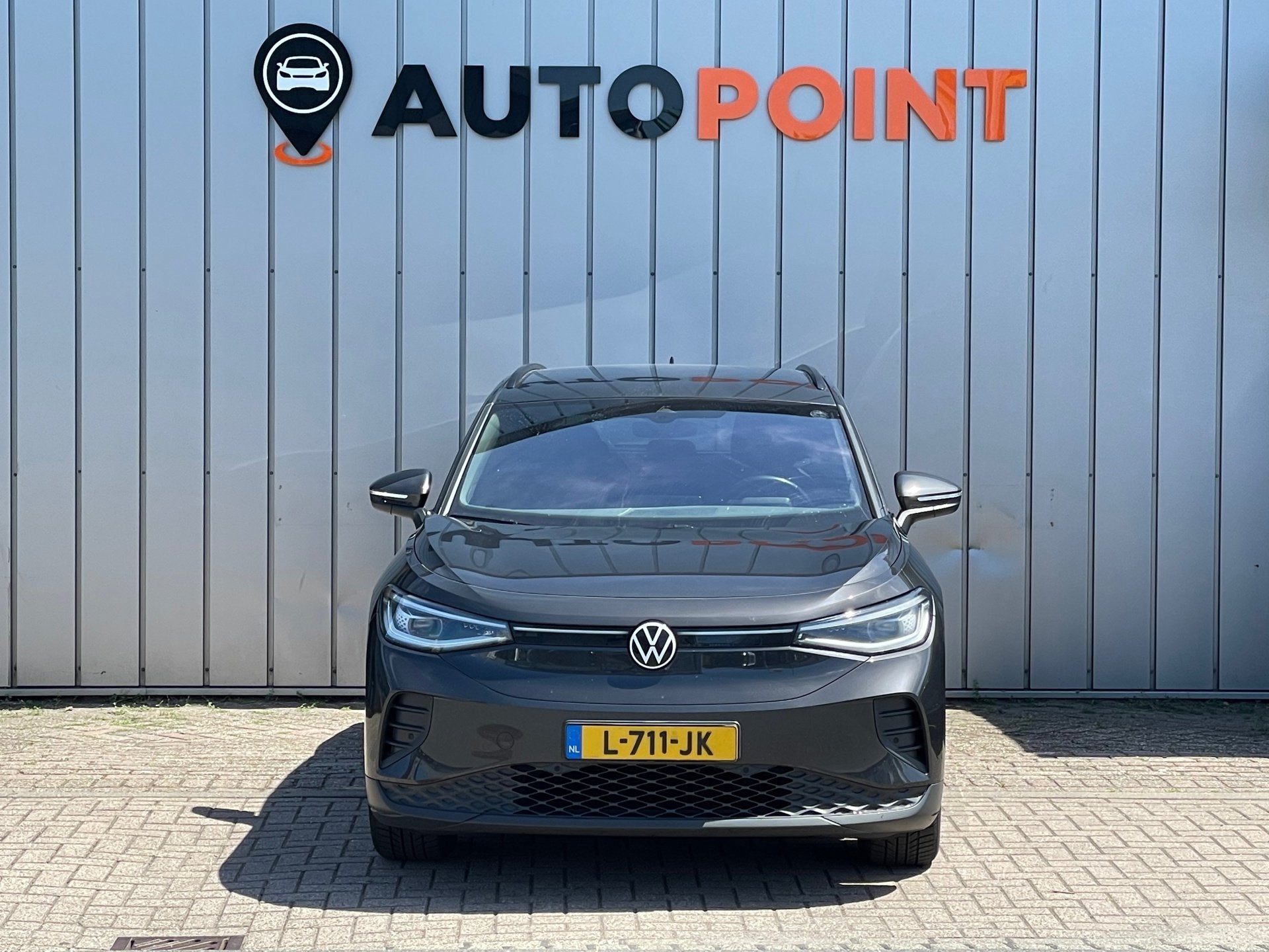 Volkswagen ID.4 Business 77 kWh 1E EIG ORG NL DEALEROND FASE, Auto's, Automaat, Achterwielaandrijving, Gebruikt, Grijs