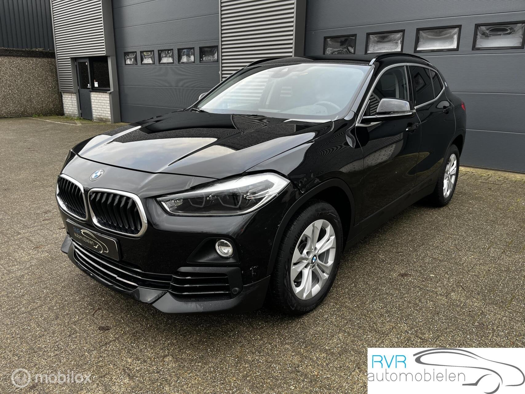BMW X2 sDrive18i Executive, Auto's, Automatische klimaatregeling, Gebruikt, Zwart, Bedrijf