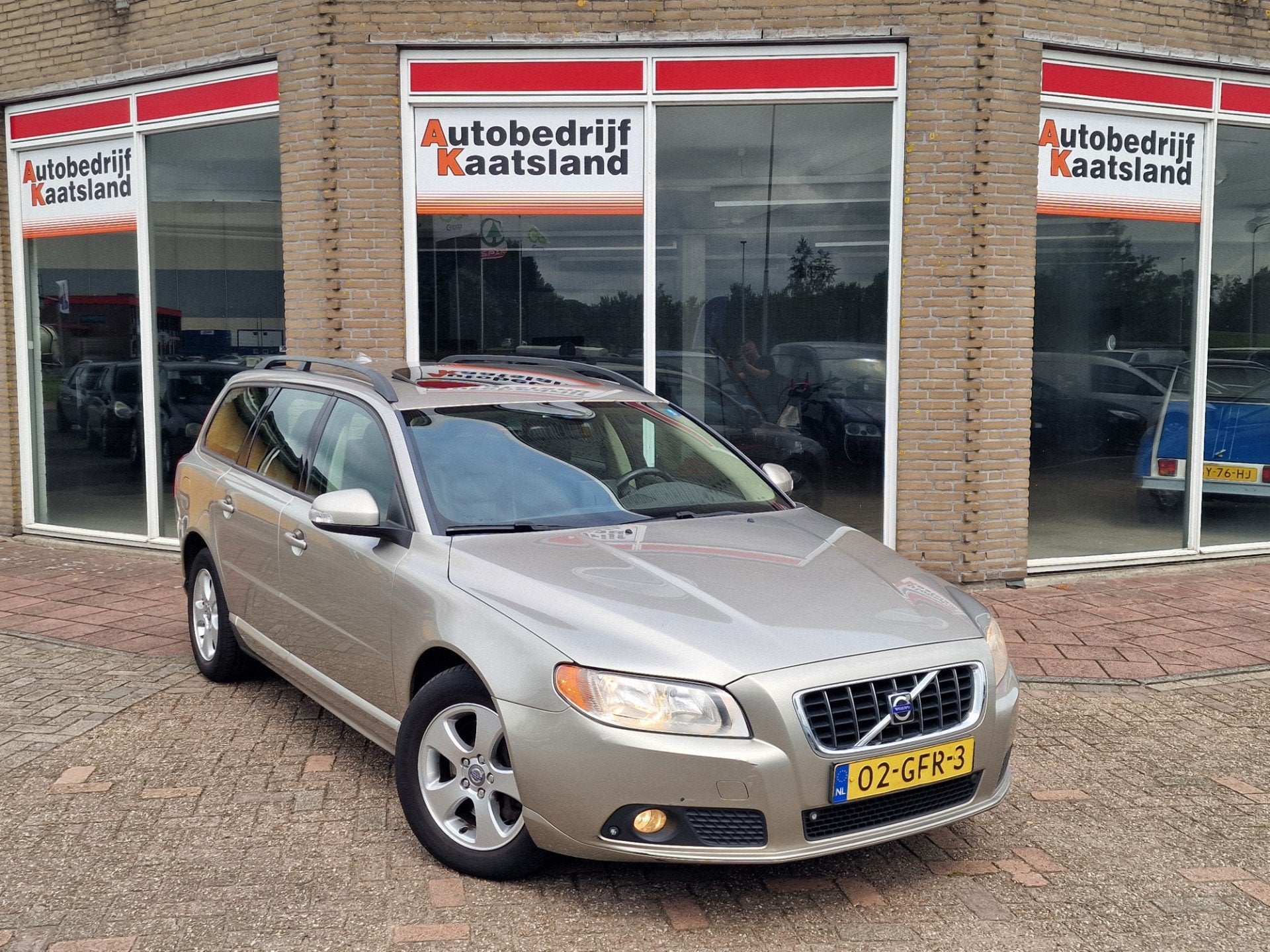 Volvo V70 2.4D D5 Momentum - Leer - Navi - Automaat -, Auto's, Zwart, 163 pk, Diesel, Euro 4