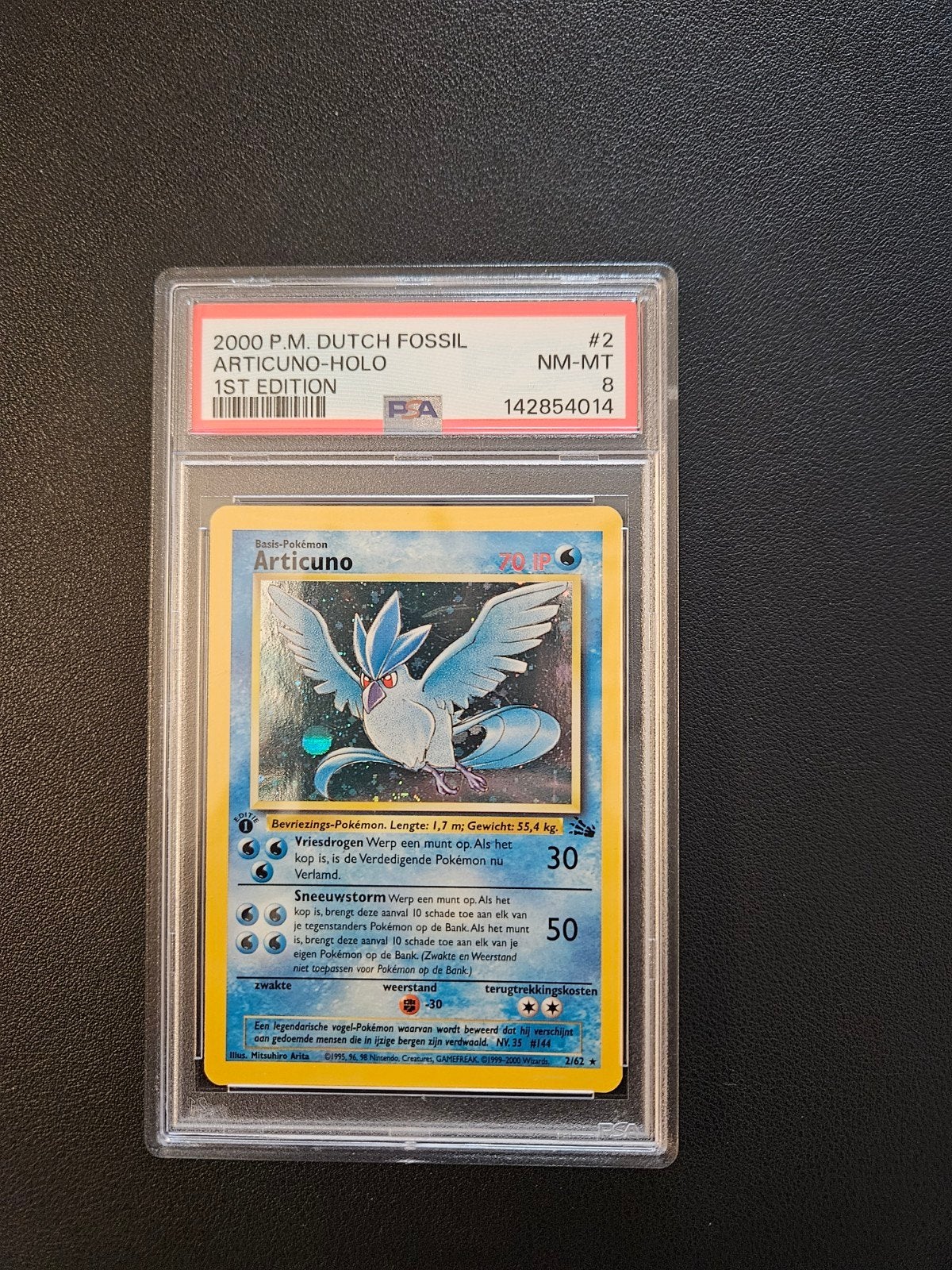 Articuno 1st Edition PSA 8 - Fossil Set Holo Pokémon Kaart, Ophalen of Verzenden, Zo goed als nieuw, Losse kaart, Foil