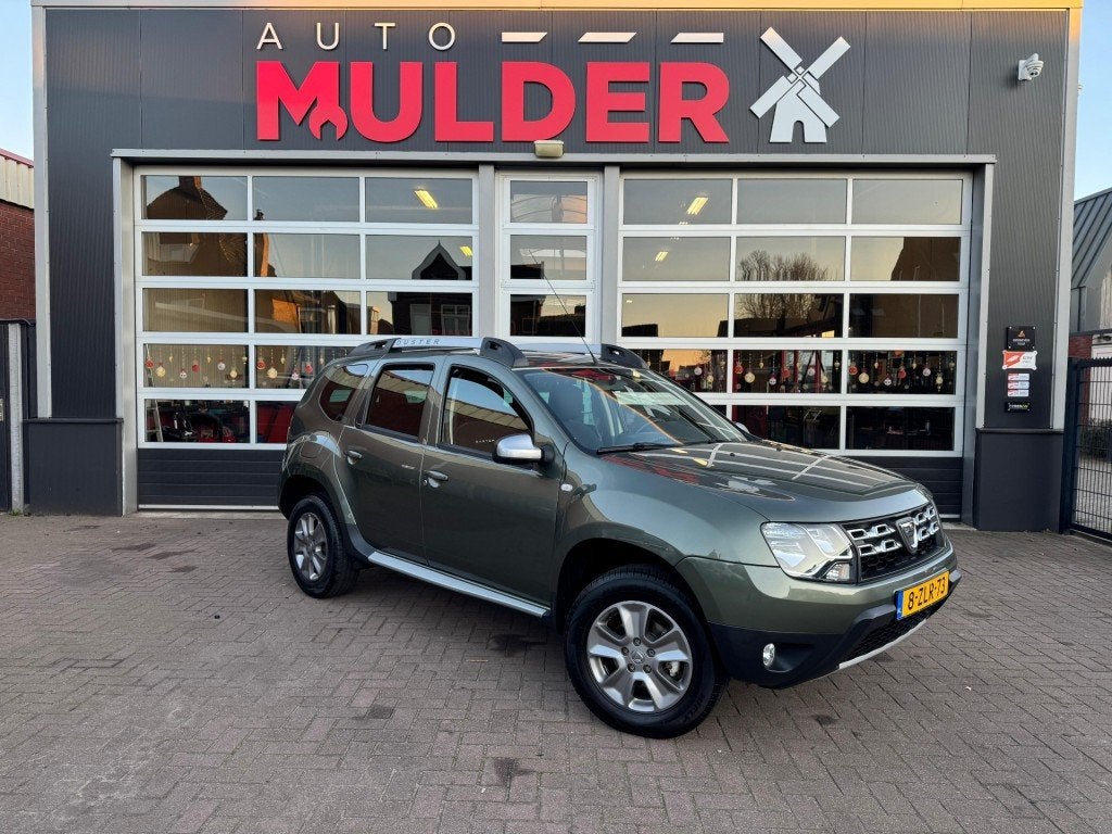 Dacia DUSTER  TCE 125 4X2 PRESTIGE / TREKHAAK / NAVI / CRUIS, Auto's, Dacia, Voorwielaandrijving, Euro 5, 125 pk, Gebruikt