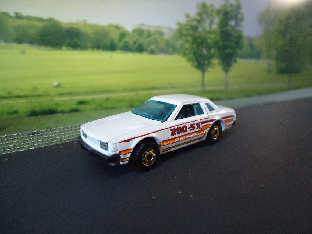 1:64 Datsun 200 SX Hotwheels Malaisia '82 te openen motorkap, Ophalen of Verzenden, Gebruikt, Auto