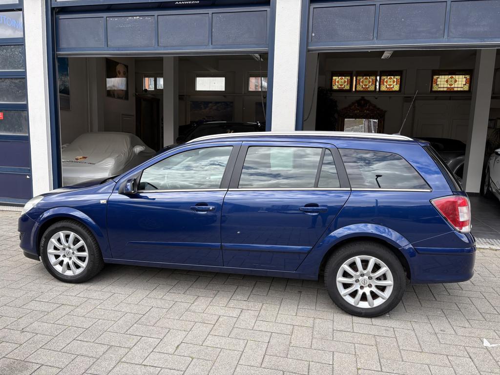 Opel Astra Wagon 1.6 Cosmo CLIMA/CRUISE/L.M VELGEN, Auto's, Voorwielaandrijving, 15 km/l, Gebruikt, Blauw