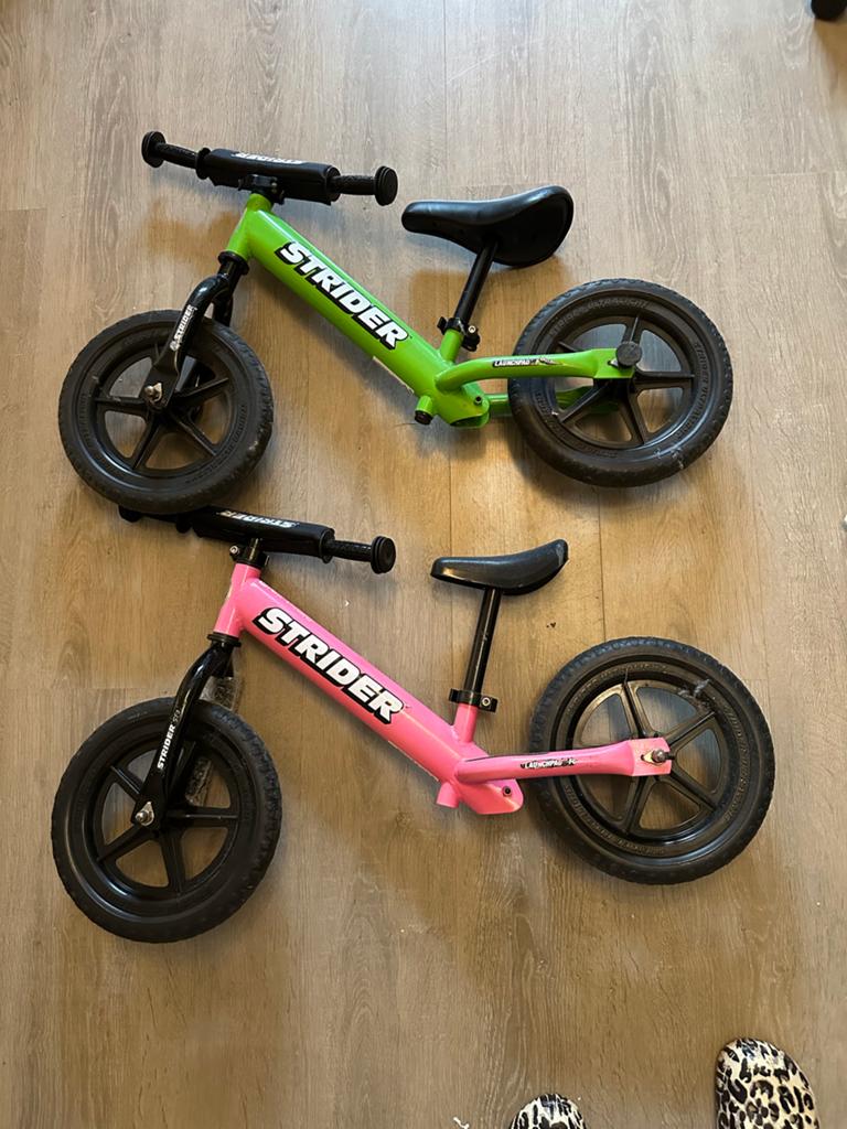 Strider loopfietsen (groen en roze), Ophalen, Gebruikt, Minder dan 16 inch