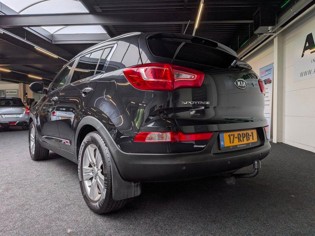 Kia Sportage 2.0 X-ecutive Plus Pack|Trekhaak|PDC|*Carplay, Auto's, Kia, Gebruikt, Zwart, 4 cilinders, Leder en Stof