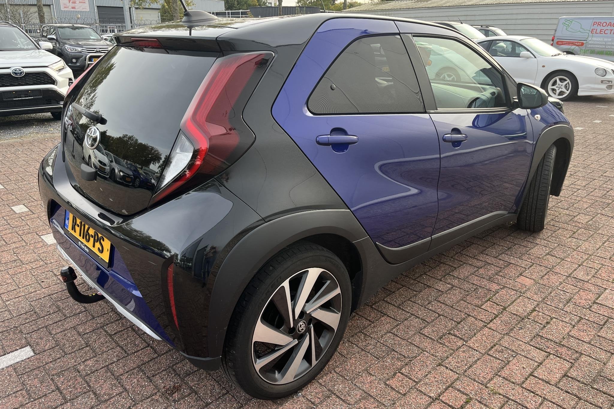 Toyota Aygo X 1.0 VVT-i MT Envy / Fietsendragerbeugel / JBL, Auto's, Toyota, Gebruikt, Leder en Stof, Origineel Nederlands, 3 cilinders