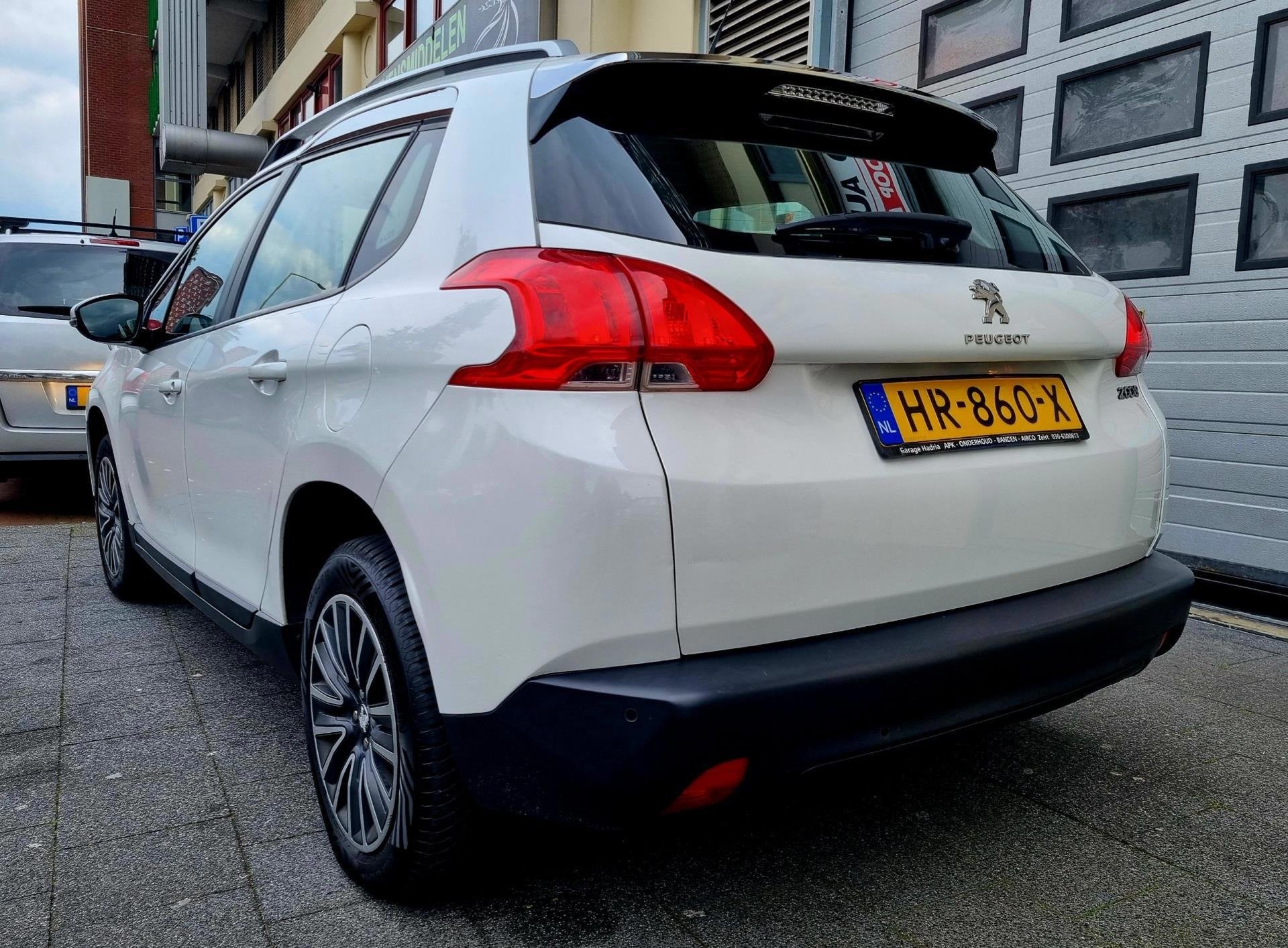 Foto 4 van Peugeot 2008 1.2 VTi Active Navi Airco