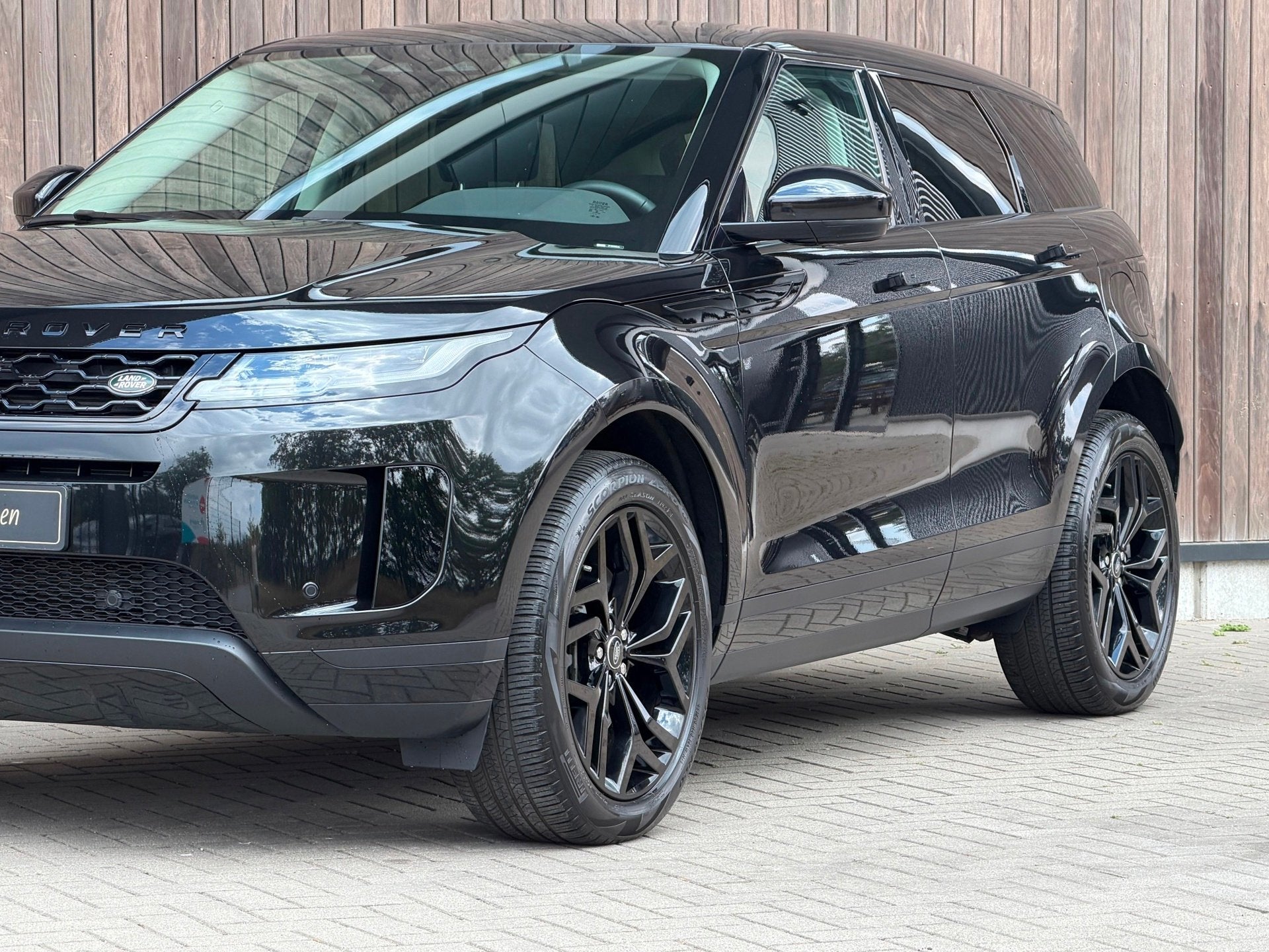 Land Rover Range Rover Evoque 1.5 P300e AWD R-Dynamic SE, Auto's, Land Rover, 309 pk, 1497 cc, Gebruikt, Zwart