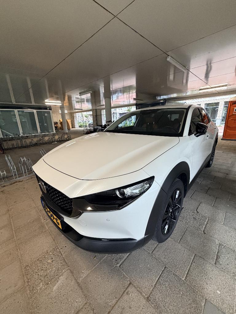 Mazda CX-30 E-skyactiv G 140pk M Hybrid Aut 2025 Wit | BTW, Auto's, Mazda, Startonderbreker, 4 cilinders, Wit, Overige kleuren