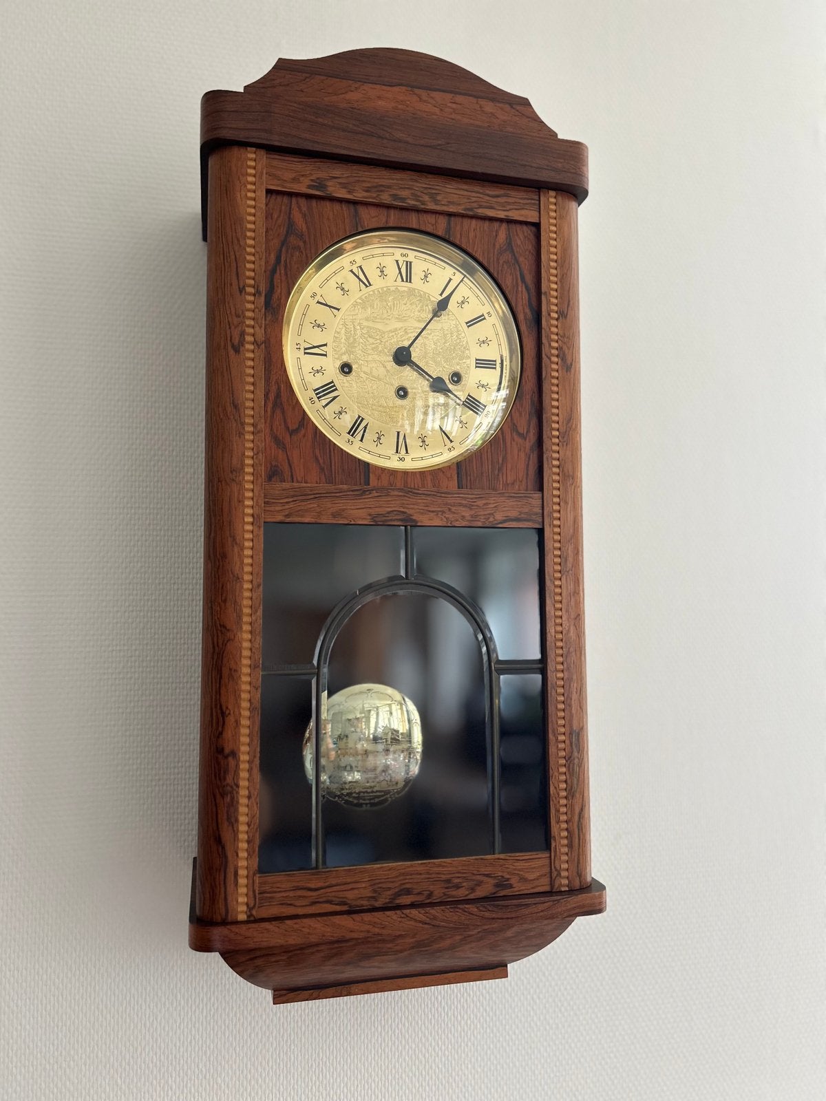Klassieke houten regulator wandklok, Ophalen