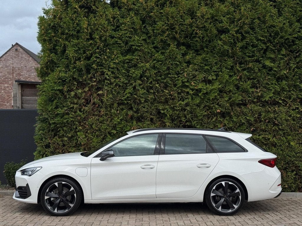 CUPRA Leon Sportstourer 1.4 e-Hybrid VZ CarPlay, Auto's, Cupra, 77 km/l, Gebruikt, Zwart, 4 cilinders