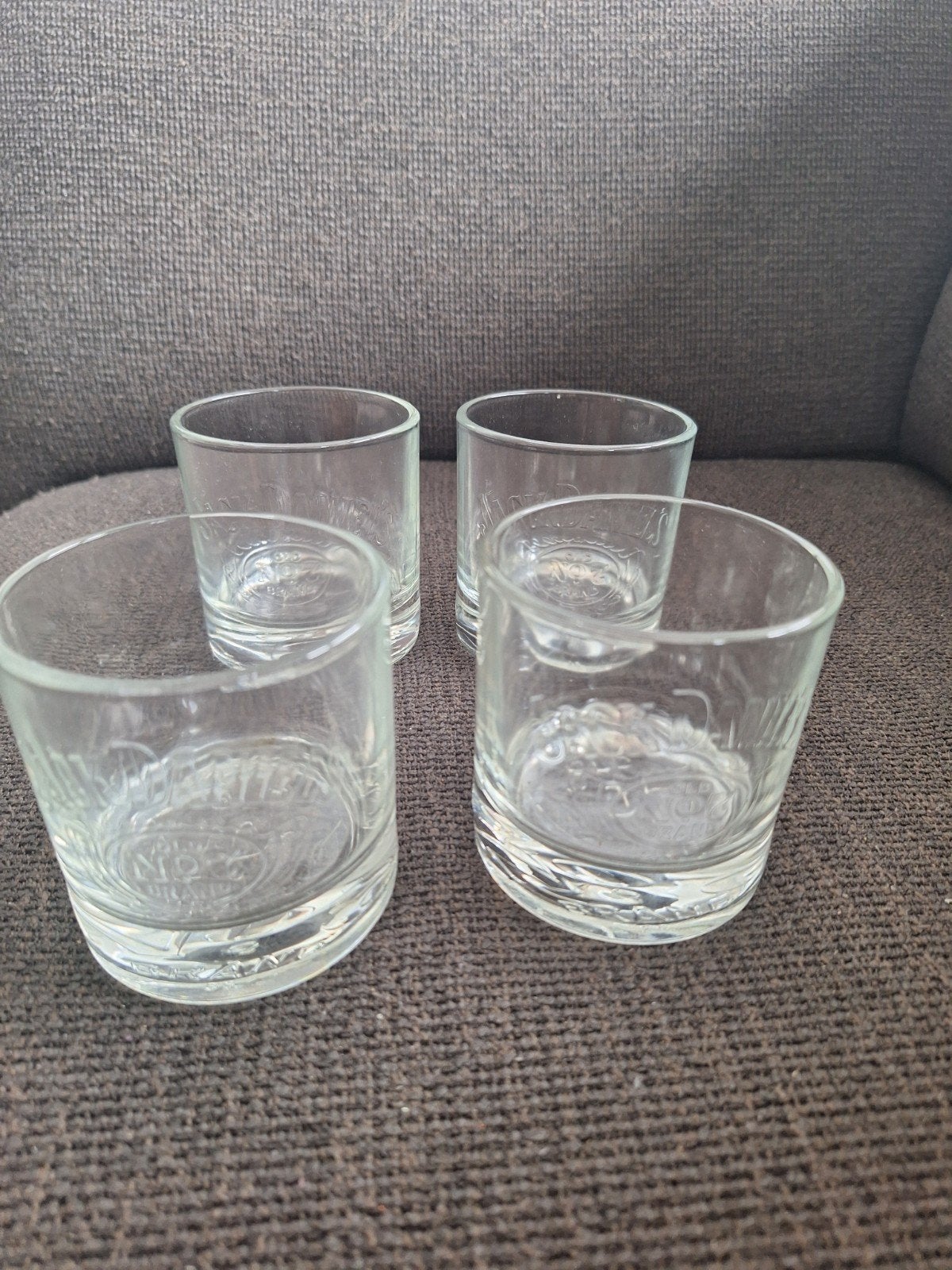 JACK DANIELS glazen 4 stuks., Ophalen of Verzenden, Zo goed als nieuw, Borrel- of Shotglas