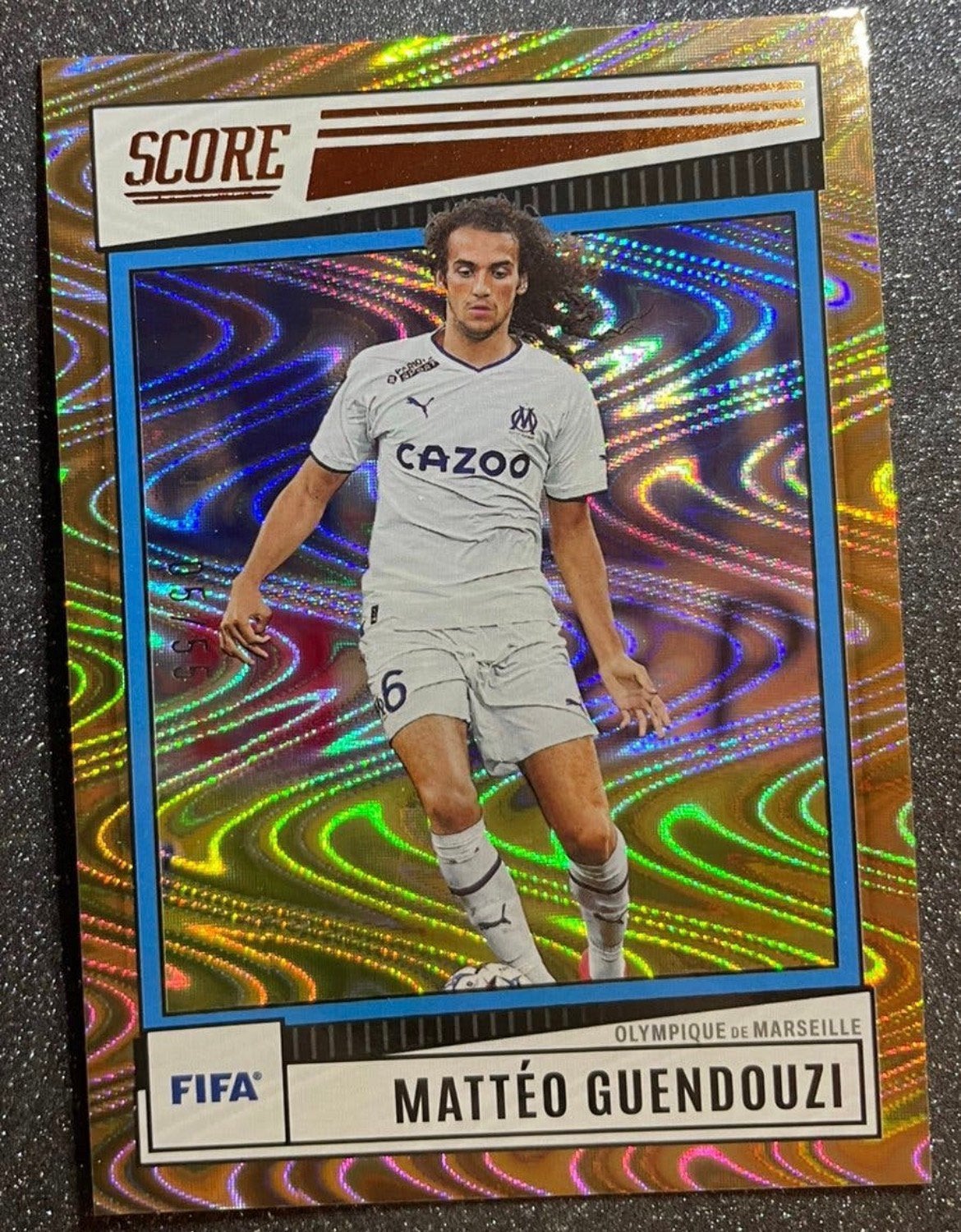 Panini SCORE 22/23   BRONZE SWIRL /55   GUENDOUZI OLYMPIQUE, Verzenden, Zo goed als nieuw, Plaatje