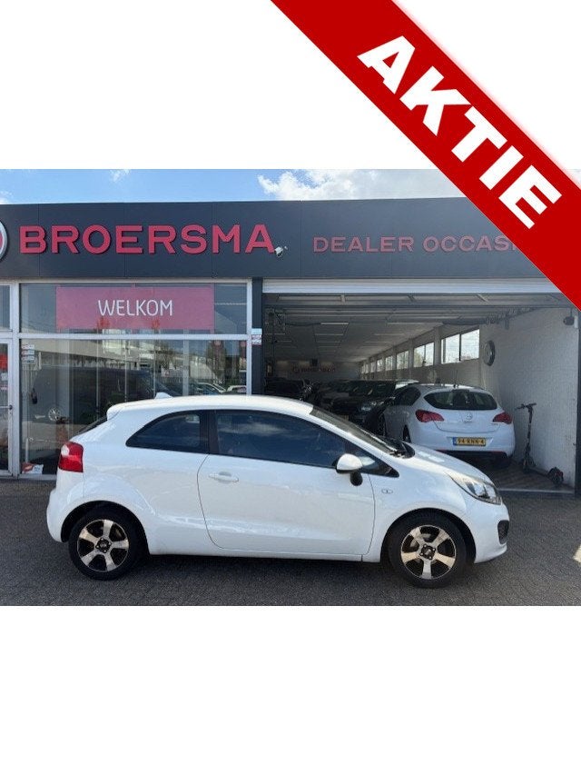 Kia Rio 1.2 CVVT Comfort Pack NIEUWE APK * (bj 2013), Auto's, Euro 5, 4 cilinders, Elektrische ramen, Wit