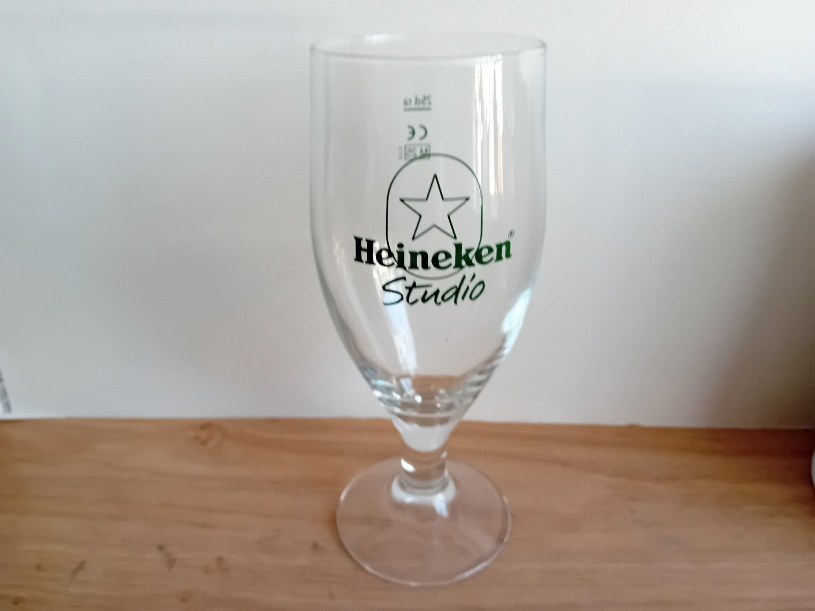 Heineken studio glas zonder opdruk, Ophalen of Verzenden, Zo goed als nieuw, Heineken