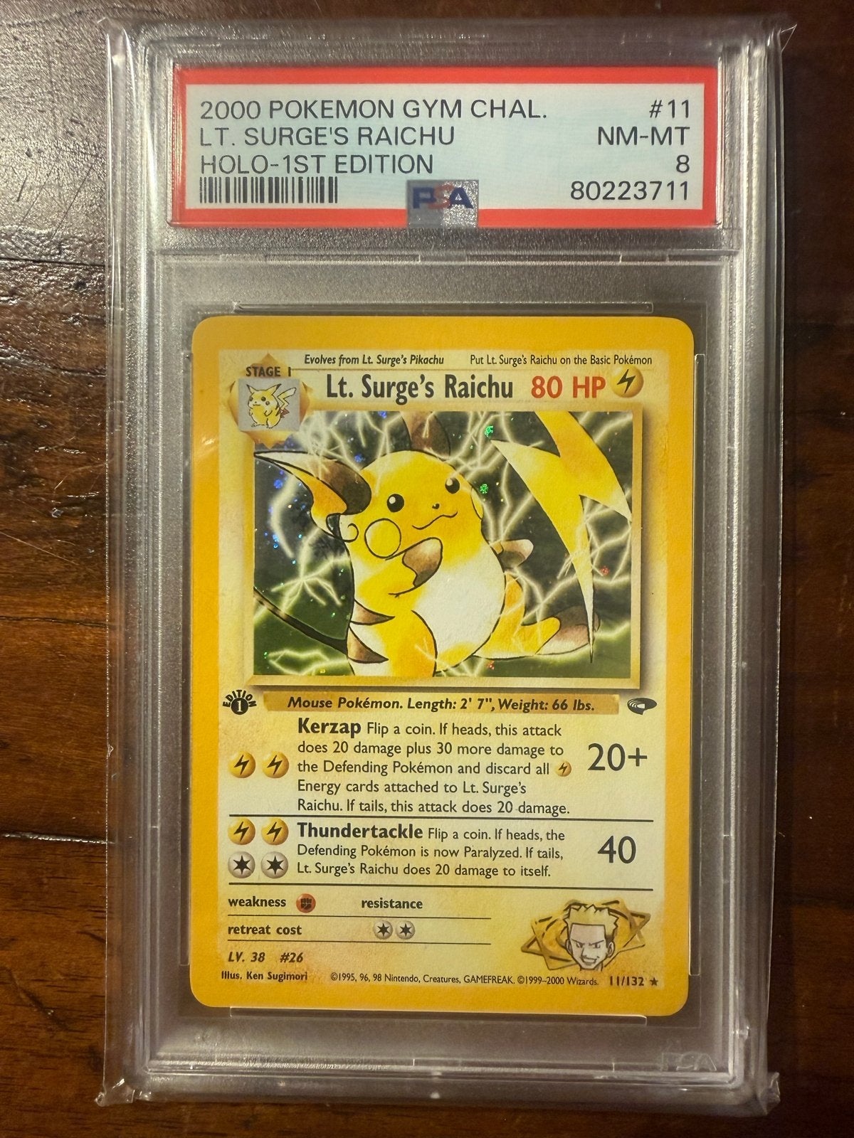 Lt. Surge's Raichu Holo 1st Edition PSA 8 Pokémon Gym Challe, Ophalen of Verzenden, Zo goed als nieuw, Losse kaart