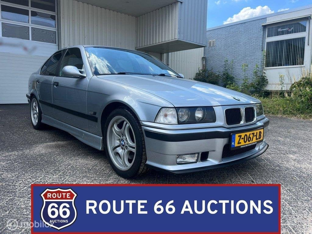 BMW M3 Sedan (E36) | 1996 | Route 66 Auctions, Auto's, Overige carrosserieën, Zwart, Bedrijf, Handgeschakeld