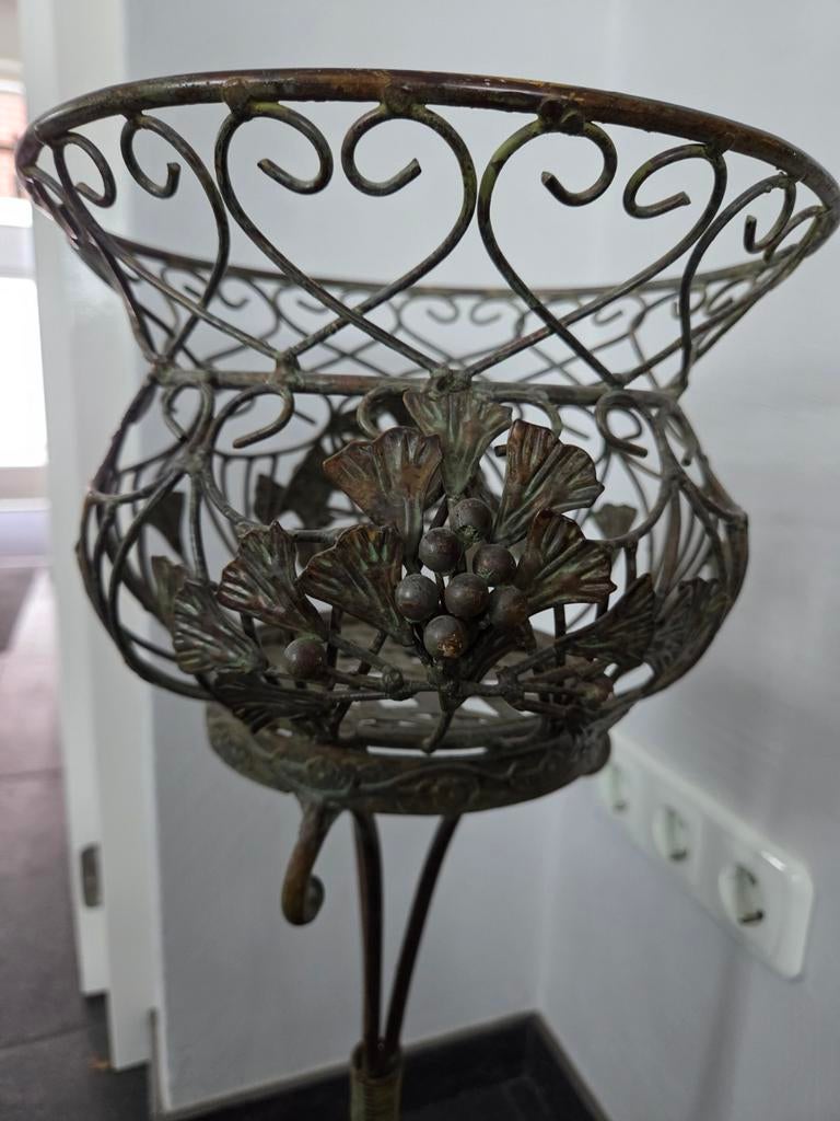 Plantenstandaard en flessenrek, Ophalen