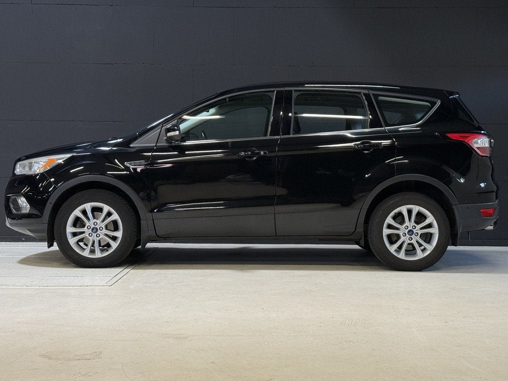 Ford Kuga 1.5 EcoBoost Titanium | Apple Carplay | Keyless |, Stof, 4 cilinders, Zwart, Origineel Nederlands