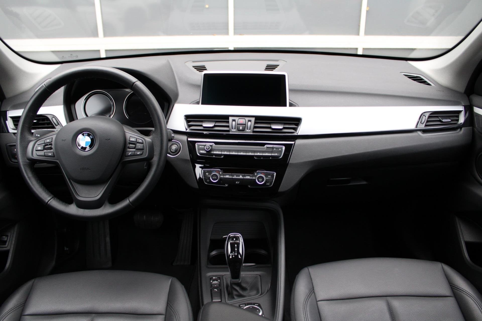 BMW X1 SDrive18i/Leer/Automaat, Gebruikt, Zwart, Leder, Bedrijf
