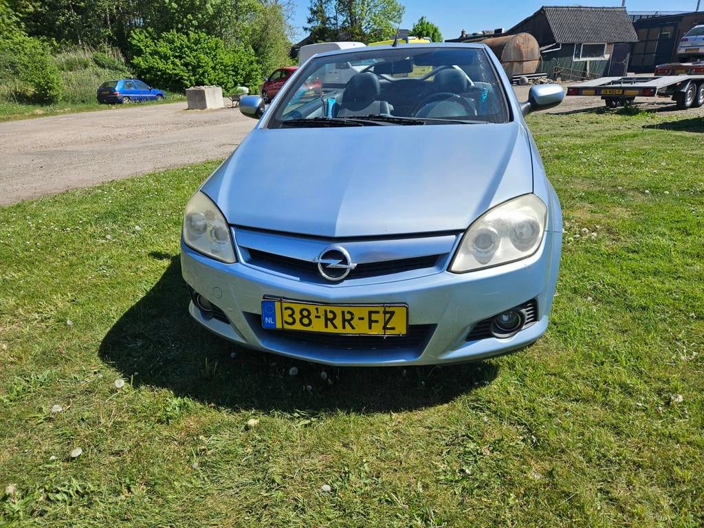 Opel Tigra 1.4 16V Twintop 2005 Blauw, Auto's, Opel, Voorwielaandrijving, 4 cilinders, Cabriolet, Blauw
