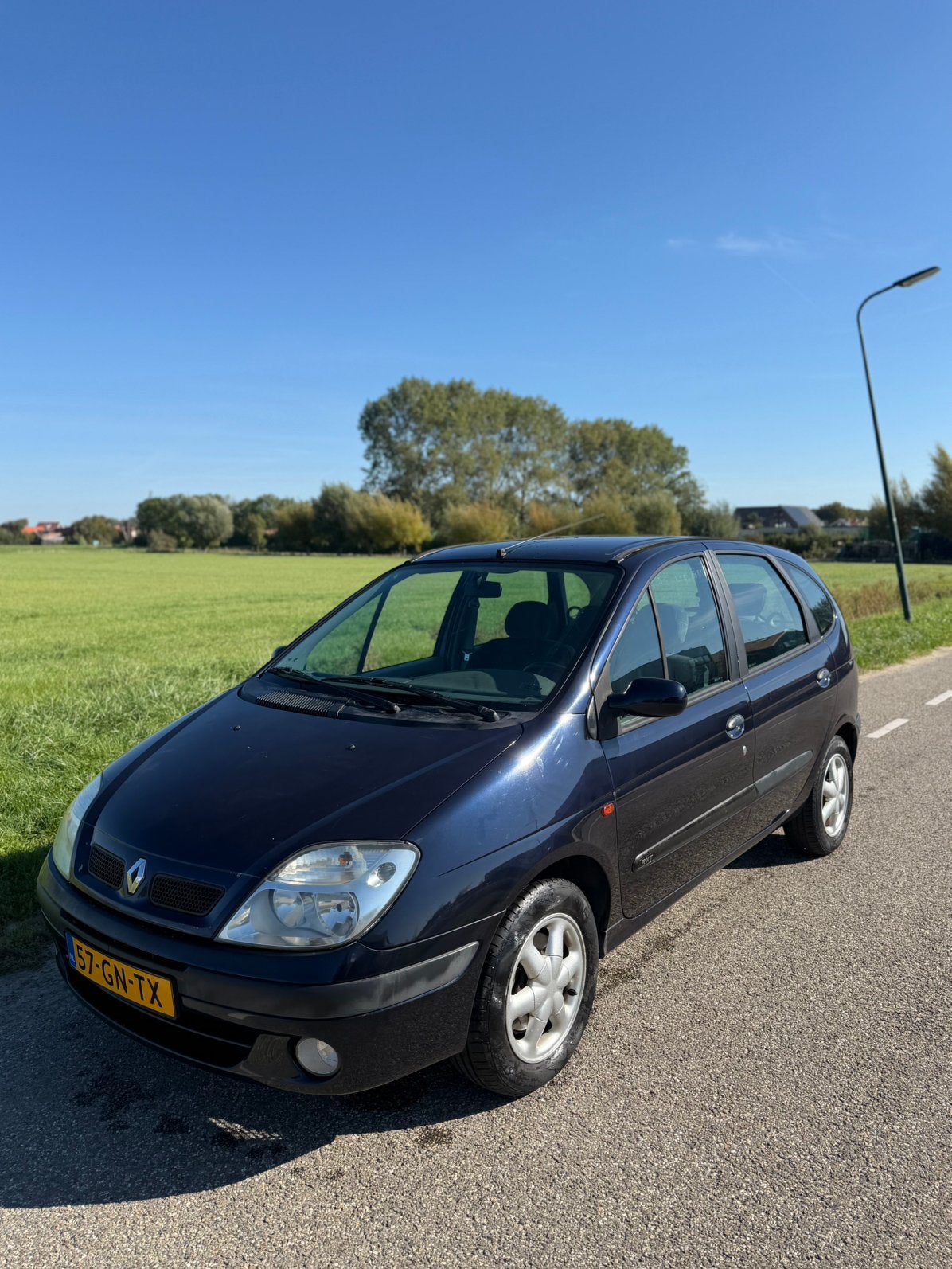 Renault Scénic 1.6 16V AUTOMAAT UNIEK LAGE KM, Auto's, Stof, 1250 kg, 4 cilinders, Blauw
