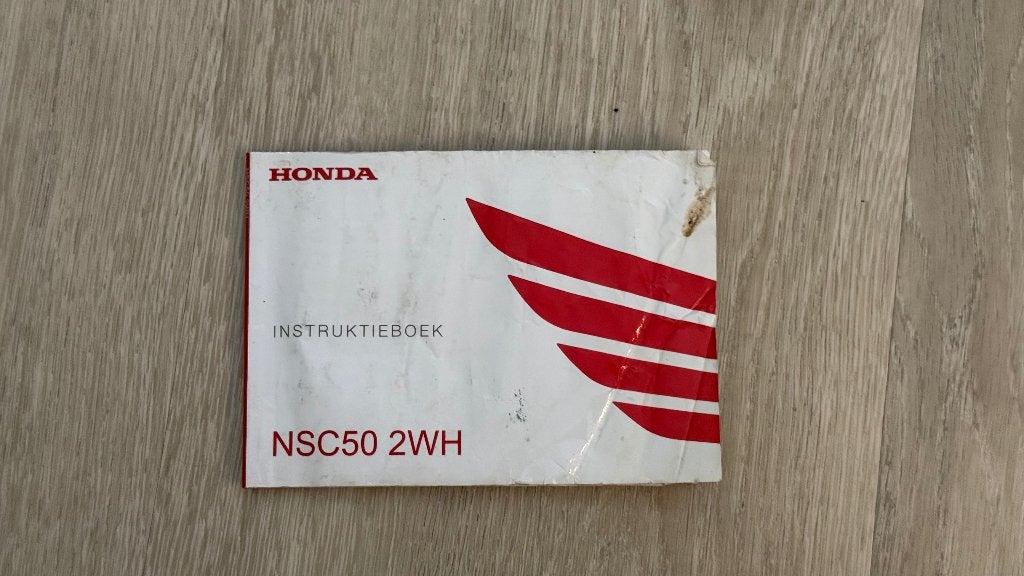 Orig. Honda NSC50 2WH / Vision 50 instructieboek – NL 2013, Ophalen of Verzenden, Gebruikt