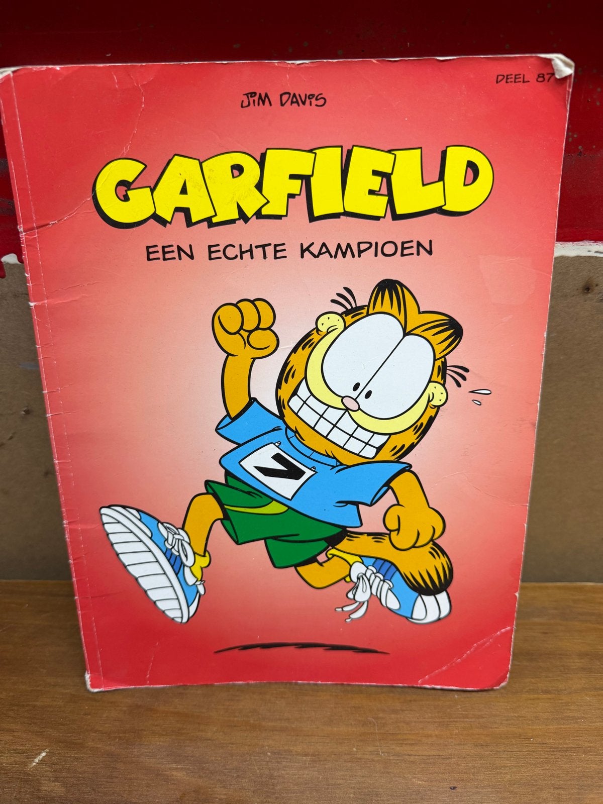 Garfield deel 87: Een Echte Kampioen - Stripboek, Eén stripboek, Ophalen of Verzenden, Gelezen